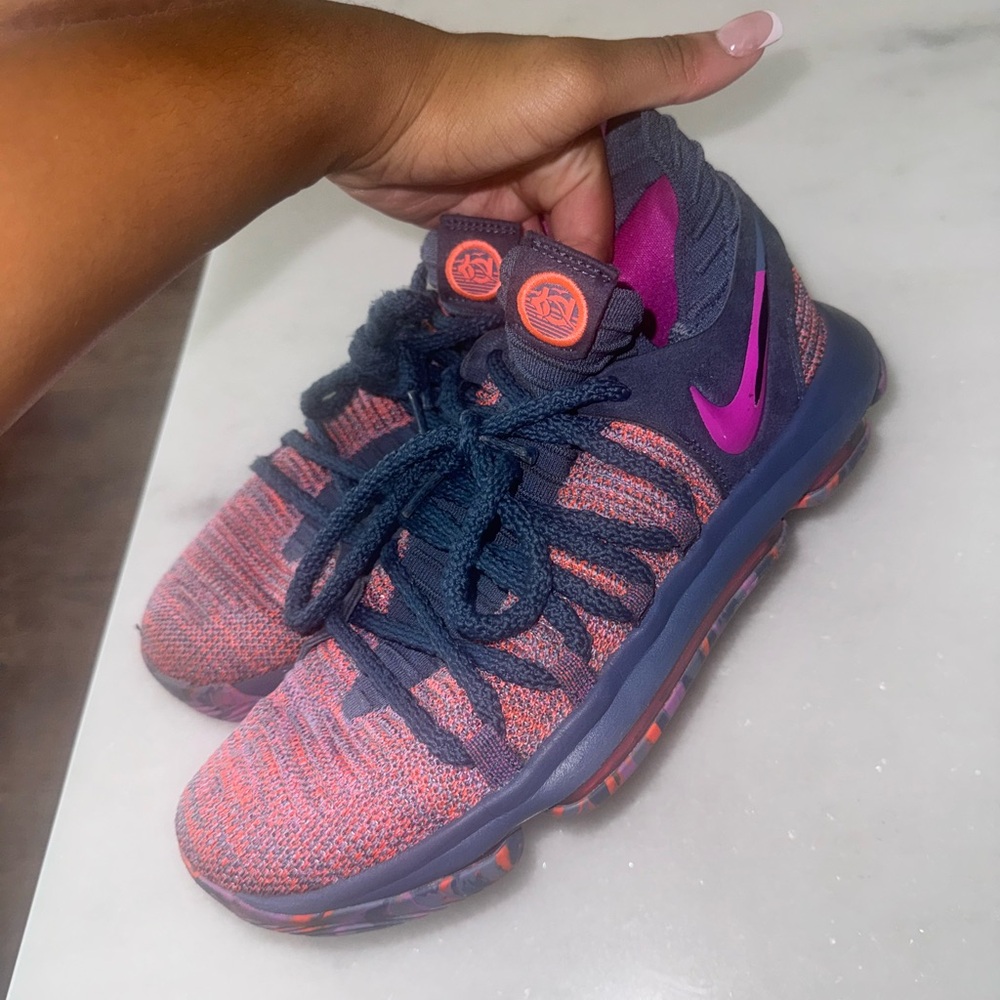 Nike KD trainers in purple and orange